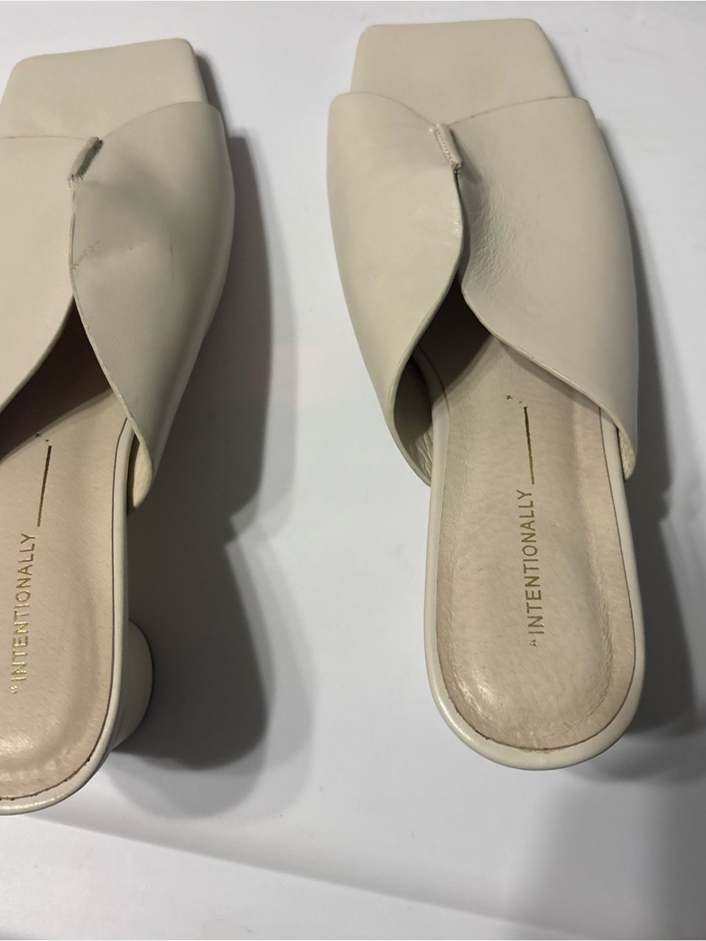 INTENTIONALLY BLANK Cream Twist Knot Slide Mules